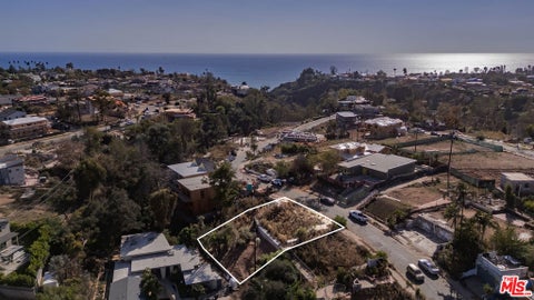 Photo of 668 Palmera Ave, Pacific Palisades, CA 90272 (MLS # 26101951)