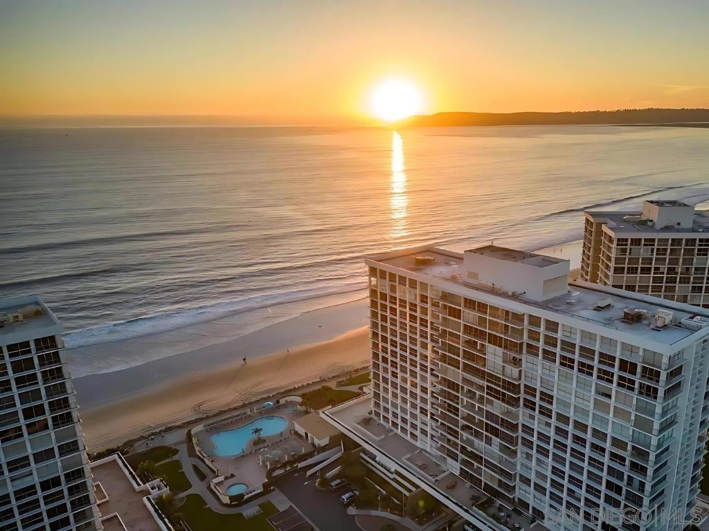 This charming, one-of-a-kind coastal retreat is located at 1750 Avenida Del Mundo, Unit 101, in the heart of beautiful Coronado, CA. This 1-bedroom, 1-bathroom residence offers approximately 1,100 square feet of thoughtfully designed living space—perfect for relaxing, entertaining, or simply enjoying the laid-back beachside lifestyle. Step inside to a light-filled, airy interior featuring central air conditioning to keep you comfortable year-round. Elegant chandeliers add a touch of sophistication to the living area, while the well-appointed kitchen comes equipped with modern appliances and the added convenience of an in-unit washer and dryer. The bathroom features a spa-like soaking tub and regular toilet—offering both modern comfort and a touch of luxury for your daily routine. After a day at the beach, unwind with the exceptional community amenities: enjoy access to 4 resort-style pools, relax in the spa, or take comfort in the 24-hour secured property. Additional highlights include secure garage parking, providing both peace of mind and everyday convenience. Whether you're looking for a full-time residence or a weekend escape, this move-in-ready unit combines comfort, style, and location—just steps from the beach and minutes from everything Coronado has to offer.