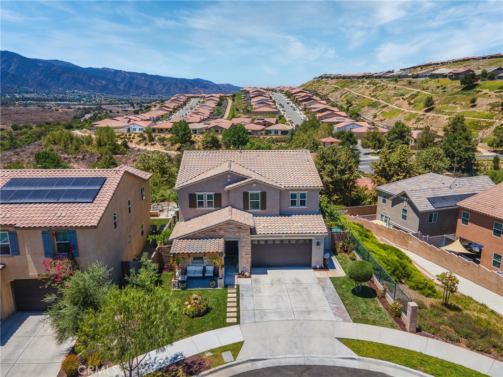 Welcome to 24821 Elison Ct. in the famous Terramor Community. Apart from being centrally located to great schools, numerous shops, dining, parks and recreation the Terramor Community itself offers a luxurious lifestyle that brings this community its prestigious reputation. This is where security meets luxury! This home is located on the end of a cul-de-sac with Mountain views from every room! Short walking distance from a playground and the path conveniently located along the left side of home leads directly to the pool! With a location like this you will truly be able to appreciate all the amenities this place has to offer! The entrance has been upgraded with a beautiful pergola so you can enjoy your front porch and the views that come with it! 4 Bedrooms 3 full Bathrooms 2,427 sq ft. Once you enter the home you have one full bedroom and bathroom down stairs ideal for guests. Built in 2018 this like new home has upgrades at every turn. Downstairs you will notice the accordion style back patio glass doors that open up really taking this open concept layout to the next level and helping you enjoy that evening mountain breeze. Enjoy shutters through the entire home. Upstairs has a generous size loft that can serve as a second living room, play room, craft area, in home school area, gym, the options are endless! Laundry is conveniently located upstairs with a custom installed barn style door. This Primary bedroom has a closet some only dream of with built in cabinets and storage made for showcasing all of your favorite pieces. Luxury size shower and tub will have you never wanting to leave this sanctuary. The neutral color pallet of this home along with the natural lighting shows the views off wonderfully! Back yard has a California room off the dining room leading to a low maintenance but well manicured lawn. The views are non obstructed with no rear neighbors so you have that extra bit of privacy. Come see your future home and take a look for yourself what photos could never describe.