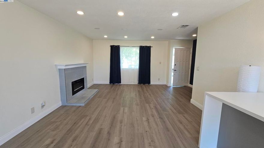Beautifully renovated 4-bedroom, 2-bath home with a 2-car enclosed garage.  This move-in ready home features brand new flooring, fresh interior paint, and completely updated bathrooms.  The kitchen boasts a brand new refrigerator, oven/range, and stylish kitchen island-perfect for entertaining.  Enjoy the convenience of an included new washer and dryer.  The roof was replaced approximately 2 years ago.  Relax or entertain in the generously sized backyard, low maintenance front yard.   A true gem in a friendly, family oriented Sacramento neighborhood.