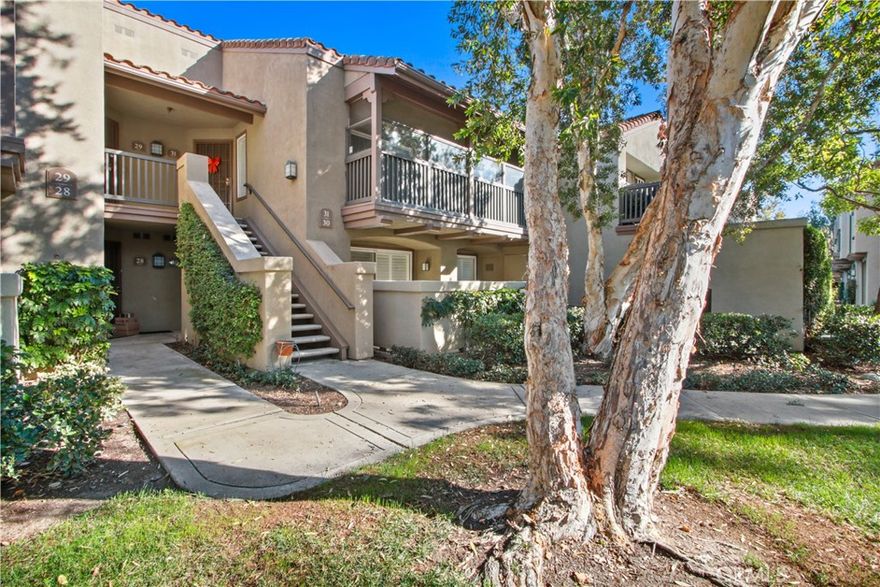 Darling TURN-KEY Mandevilla Condo in Tustin Ranch can be your new home! This highly desirable community is close to many amenities, including Tustin Ranch Golf Club, Tustin Market Place with lots of shopping, dining and entertainment. Home has lots of natural light, is ground-level and conveniently located to pool/spa, fitness area and more. Home has a spacious bedroom with large closet that has built-in shelving. The kitchen has beautiful custom cabinets, stainless steel sink with granite counter tops. The wood floors are welcoming and easy to clean. The patio has room for a BBQ and patio set. Also included are the stackable, in-home, washer and dryer and refrigerator. One car detached garage.