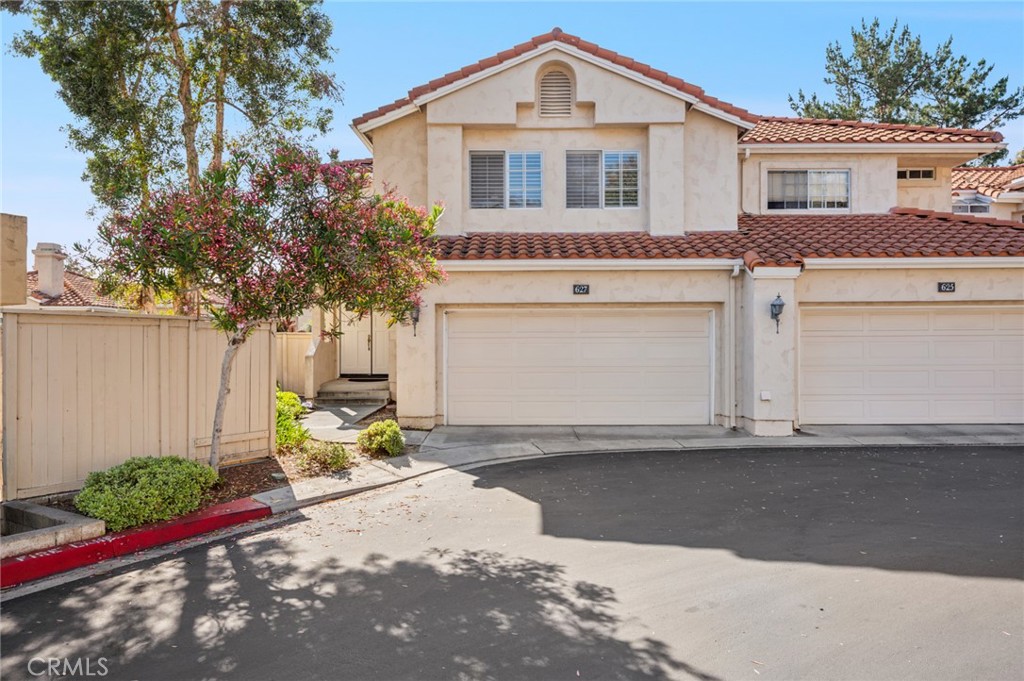 Welcome to 627 Via Presa, a beautifully upgraded coastal retreat tucked into the desirable Vilamoura community of Rancho San Clemente. This spacious two-story townhome blends style, comfort, and ocean-close living in one of Southern California’s most sought-after beach towns.
From the moment you enter, you’ll be greeted by soaring vaulted ceilings, abundant natural light, and a flowing open-concept layout that feels both airy and inviting. The living area offers a cozy fireplace, wood and tile floors, large sliding glass doors that lead to a private patio framed by lush greenery—a peaceful space for morning coffee, or weekend BBQs. Upstairs, you’ll find two generously sized bedrooms including a stunning primary suite with high ceilings, a walk-in closet, and a luxurious en-suite bathroom featuring dual sinks, a soaking tub, and separate shower. The home has a permitted loft that has been added that could easily be converted to a 4th bedroom or home office.
Additional highlights include a two-car attached garage with direct access, interior laundry, and plenty of storage. The Vilamoura community offers a resort-style pool and spa with panoramic canyon and ocean views, plus nearby access to hiking trails, Vista Hermosa Sports Park, and the beach just minutes away.
Whether you’re looking for a full-time residence or a weekend escape, 627 Via Presa offers the best of the San Clemente lifestyle—laid-back, coastal, and close to everything that matters. Don't miss this opportunity to own a beautifully maintained home in a prime location. Property being sold as-is.