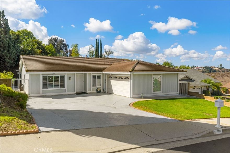 Welcome to your dream home in the highly sought-after Diamond Bar community, situated within the award-winning Walnut Valley School District! This charming single-family residence features 3 spacious bedrooms and 2 well-appointed baths, offering 1,550 square feet of comfortable living space. Step inside to discover a welcoming family room with a fireplace and an inviting living room, all centered around a beautifully remodeled kitchen complete with elegant shaker cabinets, brand new stainless steel appliances, and luxurious quartz countertops—perfect for casual dining and entertaining. The large master bedroom serves as a tranquil retreat with a stylishly remodeled 3/4 master bath, while two additional bedrooms provide ample space for family, guests, or a home office. Enjoy modern conveniences with an attached 2-car garage, laundry room, central heating and air conditioning, and numerous upgrades, including newer PEX plumbing, a durable concrete tile roof, energy-efficient dual-pane windows, and recessed lighting and ceiling fans throughout. The newly constructed covered patio offers an ideal space for outdoor gatherings and to enjoy the beautiful California weather. Don’t miss this incredible opportunity to own a piece of Diamond Bar paradise