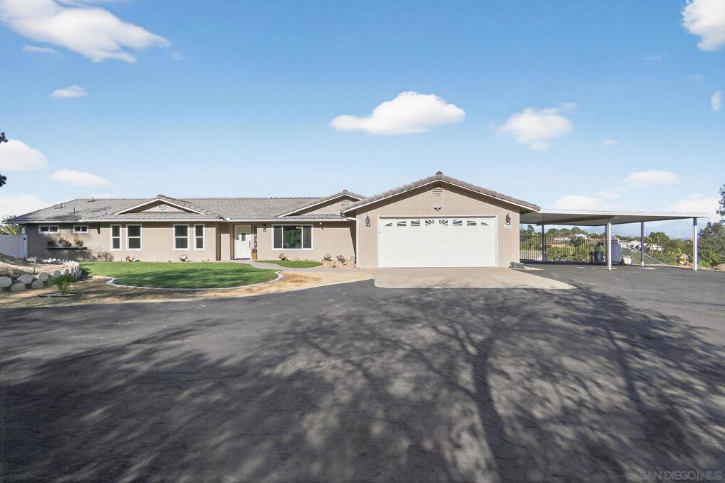Beautifully remodeled home on over 2 acres with stunning views. Perched at the end of a quiet cul-de-sac, this spacious home offers panoramic valley and mountain views from nearly every angle. Inside you will find four oversized bedrooms, including a luxurious primary suite with two expansive walk-in closets and upgraded spa-like bath with separate makeup vanity. The gourmet kitchen features newer stainless appliances, quartz countertops, and a massive island-perfect for entertaining. Fresh interior and exterior paint, new windows, new luxury vinyl flooring, along with crisp landscaping, make this home move-in ready. The exterior offers plenty of space with over 2 acres, a covered motorhome carport with hook-ups, additional 3-stall carport, oversized 2-car garage, and a 50x16 detached workshop with roll up door. There's room for horses, vineyard, toys, an ADU, and more. A truly exceptional property that blends privacy, functionality, and breathtaking views.