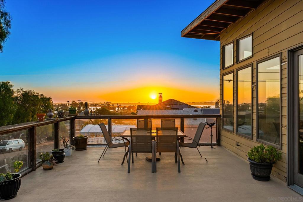 Welcome to 4436 Lister St, a spacious 4-bedroom, 3-bath Bay Park residence offering over 2,300 sq. ft. of living space on a 6,300 sq. ft. lot. Nestled in one of San Diego’s most desirable neighborhoods, this home captures sweeping views of Mission Bay and beyond, blending mid-century character with an inviting coastal setting. Step inside to find vaulted, beamed ceilings, rich wood finishes, and expansive windows that frame stunning sunsets. The main living areas flow seamlessly to an oversized deck, ideal for entertaining or relaxing while taking in the fresh bay air. The primary suite features its own sitting area, spa-like bath, and bay views, while additional living spaces and a three-car garage provide comfort and convenience. This Bay Park home offers a rare combination of generous space, timeless character, and sweeping bay views. With its versatile layout and prime location, it’s perfectly suited for those seeking a lifestyle defined by sunset views, coastal breezes, and easy access to everything San Diego has to offer.