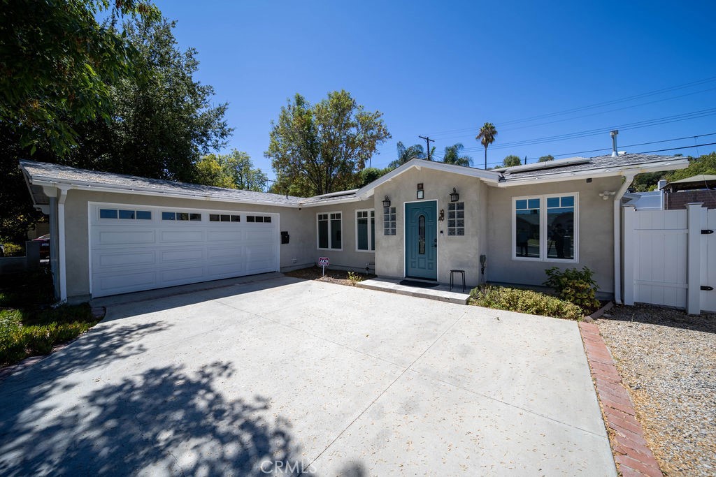 Welcome to this beautifully updated single-story residence in the highly desirable community of West Hills. This 4-bedroom, 2-bathroom home offers approximately 1,700 square feet of comfortable living space with a modern, open-concept design. The inviting layout features a chef’s kitchen with quartz countertops, stainless steel appliances, custom cabinetry, and a spacious center island that opens seamlessly to the dining and living areas. High ceilings, recessed lighting, and expansive sliding glass doors bring in natural light and create a bright, airy ambiance. The family room fireplace provides warmth and character, making this home ideal for both daily living and entertaining.
The backyard is a private retreat with ample space for outdoor dining, barbecues, and California evenings under the stars. Additional amenities include central heating and cooling, updated finishes throughout, and a two-car garage with direct access.
One of the standout features of this home is its location within the sought-after Los Angeles Unified School District. Families will appreciate being just minutes from Haynes Charter Elementary, Hale Charter Academy, and El Camino Real Charter High School—all highly regarded for their academic programs.
The neighborhood itself offers an ideal balance of suburban comfort and city convenience. Just a short drive away, you’ll find the Warner Center—the West Valley’s hub for business, shopping, dining, and entertainment. Upscale malls such as Westfield Topanga & The Village provide everything from high-end retail to casual cafes, while the nearby Commons at Calabasas is known for its boutique shops, gourmet restaurants, and vibrant community atmosphere. Whether you’re craving fine dining, a relaxed coffee shop, or family-friendly eateries, the area delivers an impressive range of options.
Outdoor enthusiasts will love the proximity to local hiking and recreation. Nearby El Escorpión Park, Upper Las Virgenes Canyon Open Space Preserve, and Ahmanson Ranch trails offer miles of scenic hiking, biking, and horseback riding. For a quick getaway, Malibu’s beaches and canyon trails are less than 30 minutes away, making this an unbeatable location for anyone who loves to blend city living with outdoor adventure.
With its updated design, excellent schools, and unbeatable access to both lifestyle amenities and natural beauty, this West Hills lease is the perfect opportunity to enjoy the best of the San Fernando Valley.