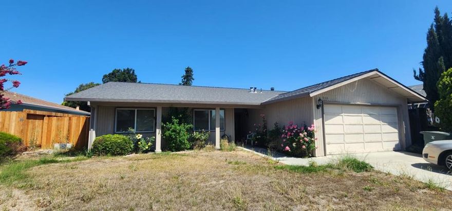 This home is in a great neighborhood with cared for homes.  It offers 3 bedrooms and 2 baths, 2 car garage with a large backyard.  Home has a great floor plan, a newer roof and dual pane vinyl windows. Bring your skills to add paint, flooring, a new shower door and a good cleaning. This home will shine!  There is a cozy living room and a huge den. The 2 could be combined for a massive living space. The possibilities are endless. SF/YB/MLS information information is approximate