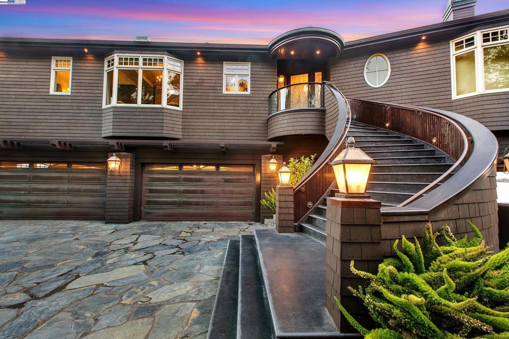 Introducing The Sea Dragon - a once-in-a-lifetime beachfront estate. This iconic and incomparable on-the-sand property is one of the largest beach lots in Santa Cruz County. Sea Dragon sits on the premier END lot of the exclusive gated Las Olas Drive (Spanish for "The Waves") community with jaw-dropping views of Monterey Bay. There are 5 large bedrooms, a chef's kitchen, home theater, and bar area - room for everyone to relax, entertain, and soak up the beach lifestyle. Walls of glass - including a dramatic curved window in the living room- create the feeling of sailing a luxury yacht at sea. A stunning mahogany paneled office, elegant stone compass rose flooring inlay in the foyer (oriented to true north), and extensive architectural details throughout. Whether you're watching whales from the expansive wraparound deck, cooking for family and friends, or simply enjoying the ocean air, this home is made for beachside living at its best. The Sea Dragon has its own private gate, 3-car garage and extra guest parking in the private driveway. This is a rare chance to own a truly special place on the California Coast. Dive into the ultimate beachfront lifestyle!