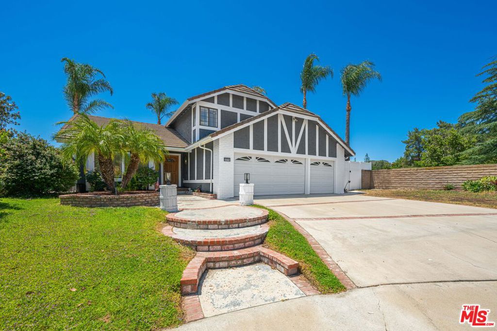Welcome to 23716 Elkwood Street! Located on a beautiful cul-de-sac in the highly desired West Hills neighborhood. Rare home with 5 bedrooms and 3 bathrooms. Enter into a formal living room with high ceilings. Updated kitchen with Viking appliances, breakfast bar and French doors that lead to the backyard. A large dining room / family room with brick accented fireplace perfect for entertaining guests. One bedroom and bathroom, and direct access to the 3 car garage completes the first floor. Upstairs you will find 4 well sized bedrooms, including the primary with en suite bathroom and walk-in closet. A guest bathroom completes the upstairs. Step outside into the private backyard oasis with pool and spa. Additional features of this home include central AC/heat, recessed lighting throughout, new duct work installed in the past year and a new furnace. Located close to a luscious park and a short distance to Topanga Mall, the Warner Center and more!