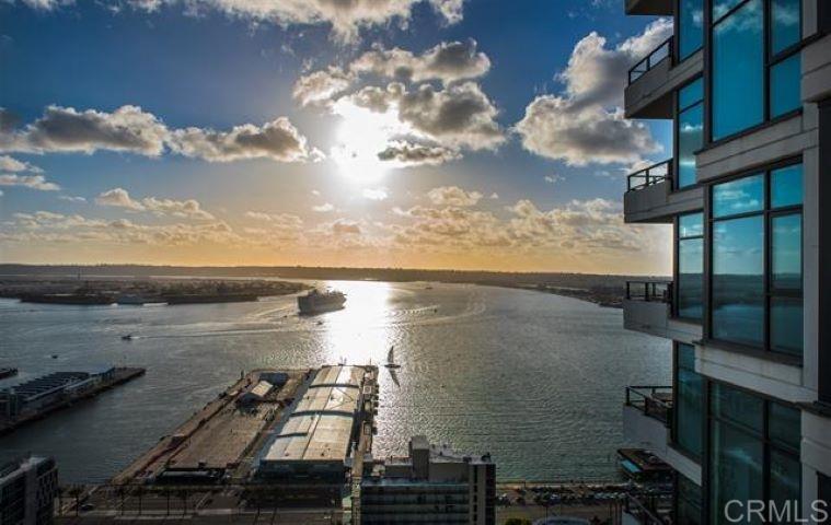 Luxurious 35th Floor Penthouse for Rent at The Grande North with Panoramic Ocean, San Diego Bay, Downtown Skyline, Coronado Bridge, and Mountain Views. This spacious 2-bedroom, 2-bath residence includes a versatile den that can serve as a third bedroom. Features custom finishes, cherry hardwood floors, a gourmet chef’s kitchen, designer lighting, and elegant paintwork. Experience luxury living at its finest with breathtaking views from every angle, ample storage, a large master suite with a walk-in closet, and a spacious master bath with a soaking tub and dual vanities. Enjoy two large private decks perfect for sunsets and sunrise moments. Included are two parking spaces. The Grande North offers exclusive amenities such as a lap pool, spa, steam rooms, sauna, BBQ area, community room with kitchen for private events, 24/7 security, concierge services, and a guest suite. This exceptional penthouse presents the ultimate lifestyle—highlighted by stunning outdoor decks, stylish interiors, and top-tier amenities. Don’t miss this rare opportunity to live at the top!