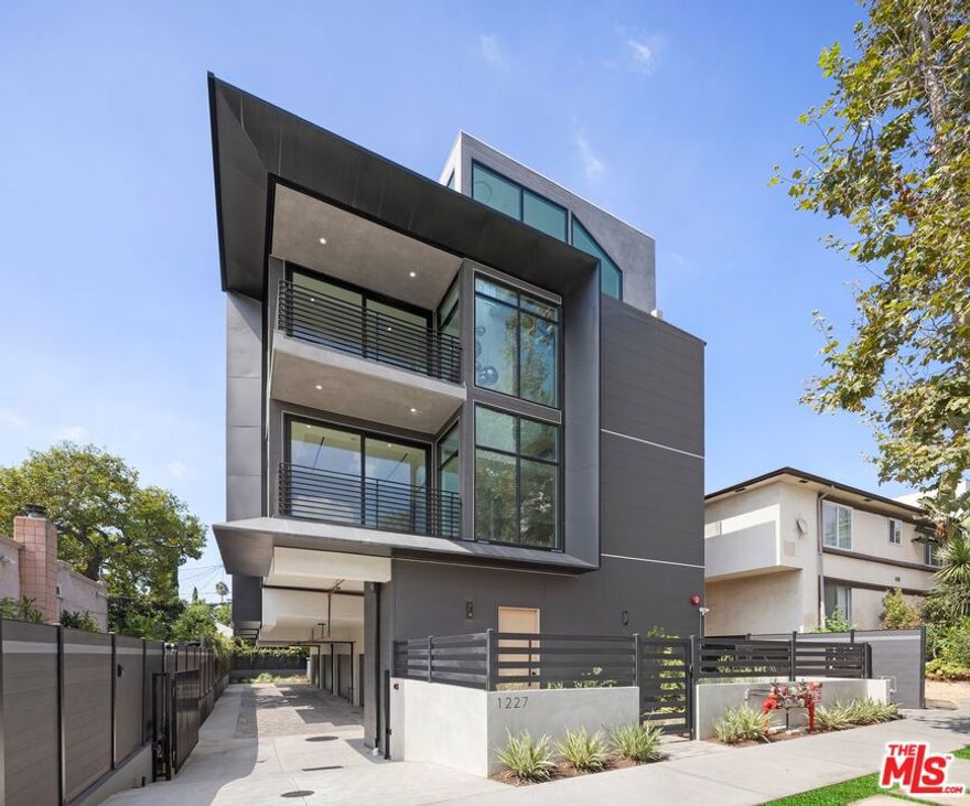 Residence Two at Weho F1 is a sophisticated two-bedroom, two-and-a-half-bath home that embodies modern architectural pedigree with soaring 11-foot ceilings, a bright open-concept living plan, and a large private rooftop patio that creates an exceptional indoor-outdoor lifestyle. Floor-to-ceiling Milgard windows, wide-plank oak flooring, and expansive living and dining areas enhance the natural light and effortless flow throughout, anchored by a dramatic great room that frames treetop and sky views. The sleek gourmet kitchen provides a refined backdrop for entertaining and everyday living, while both bedrooms are generously proportioned with spa-like en suite baths and a thoughtfully designed powder room. Set within Weho F1, an intimate boutique building in the heart of West Hollywood, this residence offers an elevated lifestyle just moments from Melrose, Beverly Grove, and the city's most coveted dining, shopping, and cultural destinations.