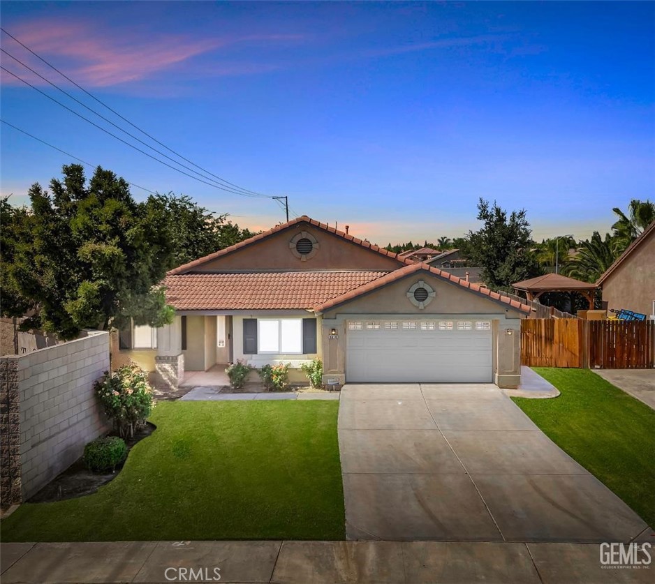 Stunning move in ready home in desirable Tradewinds community. As soon as you walk in you will fall in love with the open floor plan that provides tons of natural lighting and is great for entertaining. The home offers 4 bedrooms and 2 full baths with split wing floor plan. The large kitchen is a cooks dream and has large island, plenty of cupboard and counter space, walk in pantry, stainless appliances and luxury quartz. The property also features indoor laundry room, lots of storage throughout, fresh paint. The large main bedroom has double walk-in closets, sliding door with outdoor access, soaking tub, double sink vanity, and stand in shower. The other 3 bedrooms feature plush new carpet, fans throughout, and new blinds. Enjoy your time in the nicely landscaped backyard with covered patio, sitting area and block wall that is great for privacy. Finished large 2 car garage. Great curb appeal with mature landscaping. This well cared-for home is close to shopping and walking distance to park.