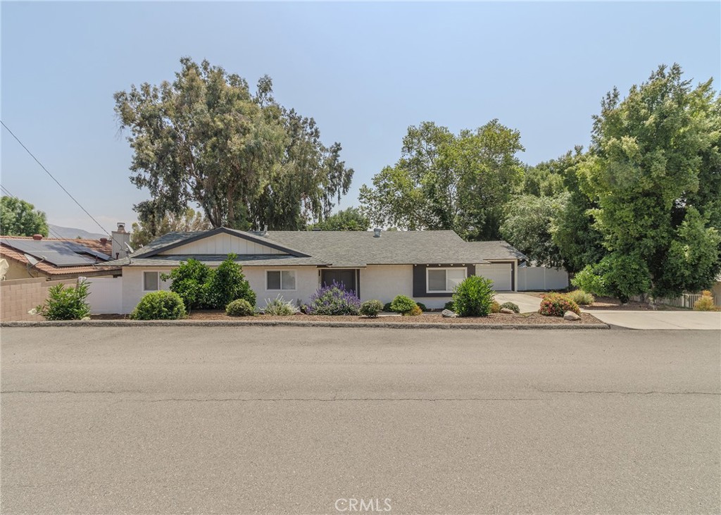 Discover the potential of your dream home located in the well-established neighborhood of El Cerrito, Corona. This spacious 4-bedroom, 3-bath home demonstrates excellent care and maintenance, showcasing its true ownership. The property features impressive curb appeal with a well-kept front yard and an ample driveway, creating a welcoming entrance. Inside, the floor plan offers ample space, making it ideal for larger families or entertaining guests. The kitchen, equipped with newer cabinetry, presents an excellent opportunity for culinary enthusiasts to bring their ideas to life. The expansive backyard is a valuable asset, providing a perfect space for summer activities and larger gatherings. Living in this community offers a harmonious blend of outdoor opportunities, including hiking and friendly interactions with neighbors, making it a great environment for building lasting connections. Embrace the possibilities this home has to offer!