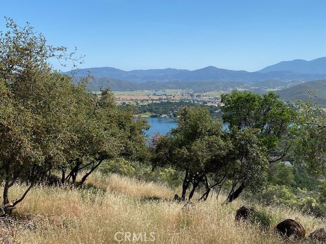 Great downsloped lot on view side of quiet cul-de-sac has panoramic lake and valley views. Soils analysis on file at 63' per bedroom.