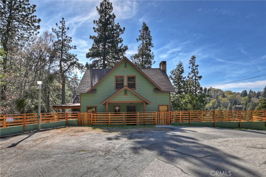 This exquisite cabin—yet truly a home away from home—is the perfect place to get away while still being close to everything. Unlike other mountain destinations, Crestline offers quick access to Lake Gregory, Big Bear, Lake Arrowhead, and local ski resorts—without the traffic! From here, you can simply walk to Lake Gregory for a refreshing lakeside stroll, or take a short walk into town for coffee shops, restaurants, grocery stores, and all the essentials.
This is a true mountain gem, offering the ideal blend of rustic charm and modern comfort. Inside, you’ll find:
 • Main Level: 4 bedrooms plus a bonus room, 2 fully remodeled bathrooms, and an upgraded kitchen with newer cabinets, granite countertops, and top-of-the-line appliances.
 • Recent Updates: New flooring, fresh paint inside and out, and all three outdoor decks refurbished. A professionally installed 50-year composition roof adds lasting value.
 • Downstairs Unit: A complete additional living space with its own entrance, featuring 1 bedroom, a remodeled bathroom, a kitchen with granite countertops, upgraded cabinets, and new appliances.
That’s a total of 5 bedrooms + bonus room, 3 bathrooms, and approximately 600–700 sq. ft. of additional space not shown in tax records. Perfect for multi-generational living, guest quarters, or rental income opportunities.
The property sits on 4 combined lots (#57–60) totaling over 10,000 sq. ft., purchased intentionally to provide extra space and privacy so no one can build right next door. Outdoors, enjoy multiple entertaining areas including a wraparound wood deck, two patios, and level yard space. One patio even has 220V wiring already installed—perfect for adding your own jacuzzi.
Additional highlights:
 • Level entry with parking for 6+ vehicles (a true mountain luxury!)
 • Ample storage and cabinetry throughout
 • Ideal for full-time living, part-time retreats, or as an investment property
Crestline is one of Southern California’s best-kept secrets—a welcoming community with year-round events, endless outdoor activities, and an easy commute to San Bernardino and surrounding cities.
Don’t miss this opportunity to own a versatile mountain retreat—schedule your private showing today, before it’s gone!