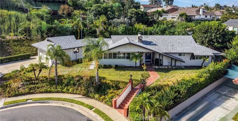 Photo of 561 Crooked Arrow Dr, Diamond Bar, CA 91765 (MLS # PW26088931)