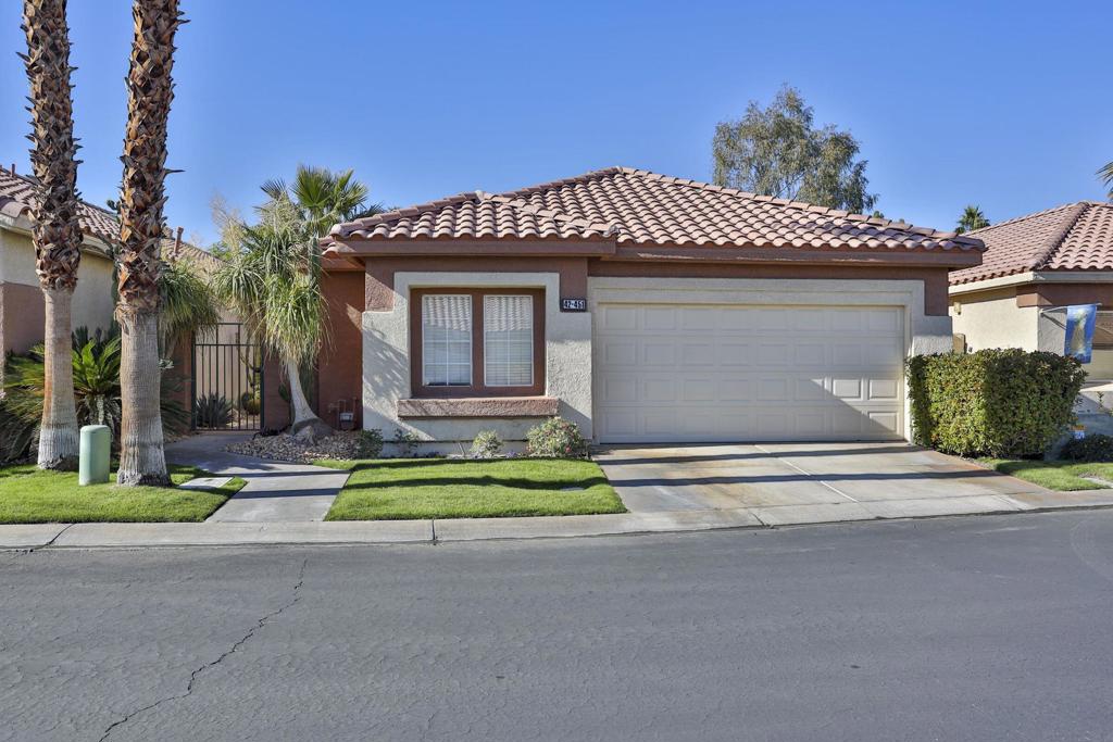 Experience the ease of country club living at , The Oasis Country Club one of Palm Desert's most popular private communities. Ideally situated just steps from the clubhouse, this residence presents the largest floor plan within the community 1787 square feet of airy, light-filled living space designed for comfort and style. PAID OFF SOLAR is an additional benefit. Inside, you'll find three spacious bedrooms, two bathrooms, living room and den, cathedral ceilings, and an open layout that blends elegance with everyday functionality. A gas cooktop, indoor laundry, and direct garage access enhance convenience, while large windows frame beautiful golf course views.Perched on an elevated lot above the first fairway, this home invites seamless indoor-outdoor living. The expansive patio provides the perfect setting for al fresco dining, gatherings with friends, or quiet evenings overlooking the greens.From your doorstep, stroll to the clubhouse for breakfast, lunch, dinner, or happy hour, or unwind by the Enclave pool and spa, located just moments away.The Oasis Country Club is a member-owned, self-managed community, celebrated for its impeccable care and welcoming spirit. Residents enjoy access to an award winning 18-hole golf course, 18-hole putting course, three tennis and pickleball courts, 18 pools and spas, all in a gated community.At The Oasis, every day feels like a retreat. Discover the charm, community, and understated elegance that make this club one of Palm Desert's true treasuresa''centrally located and close to world-class dining, entertainment, and recreation.