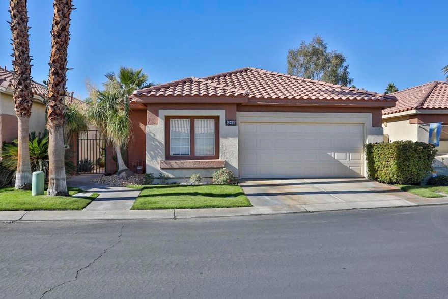 Experience the ease of country club living at , The Oasis Country Club one of Palm Desert's most popular private communities. Ideally situated just steps from the clubhouse, this residence presents the largest floor plan within the community 1787 square feet of airy, light-filled living space designed for comfort and style.  PAID OFF SOLAR is an additional benefit.  Inside, you'll find three spacious bedrooms, two bathrooms, living room and den, cathedral ceilings, and an open layout that blends elegance with everyday functionality. A gas cooktop, indoor laundry, and direct garage access enhance convenience, while large windows frame beautiful golf course views.Perched on an elevated lot above the first fairway, this home invites seamless indoor-outdoor living. The expansive patio provides the perfect setting for al fresco dining, gatherings with friends, or quiet evenings overlooking the greens.From your doorstep, stroll to the clubhouse for breakfast, lunch, dinner, or happy hour, or unwind by the Enclave pool and spa, located just moments away.The Oasis Country Club is a member-owned, self-managed community, celebrated for its impeccable care and welcoming spirit. Residents enjoy access to an award winning 18-hole golf course, 18-hole putting course, three tennis and pickleball courts, 18 pools and spas, all in a gated community.At The Oasis, every day feels like a retreat. Discover the charm, community, and understated elegance that make this club one of Palm Desert's true treasuresa''centrally located and close to world-class dining, entertainment, and recreation.