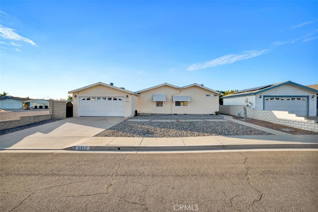 This is a beautiful home!!! Wow pride of ownership inside and out. The living room has a cozy fireplace large window for light, large kitchen with plenty of counter space and cabinetry inside laundry room off kitchen with storage new appliances. mater bedroom has large walk in closet and large master bath. Great front pouch to set a enjoy the view. This Seven Hills community is 55+ living at its best well maintained. Please come see for yourself I am sure you won't want to miss this one.