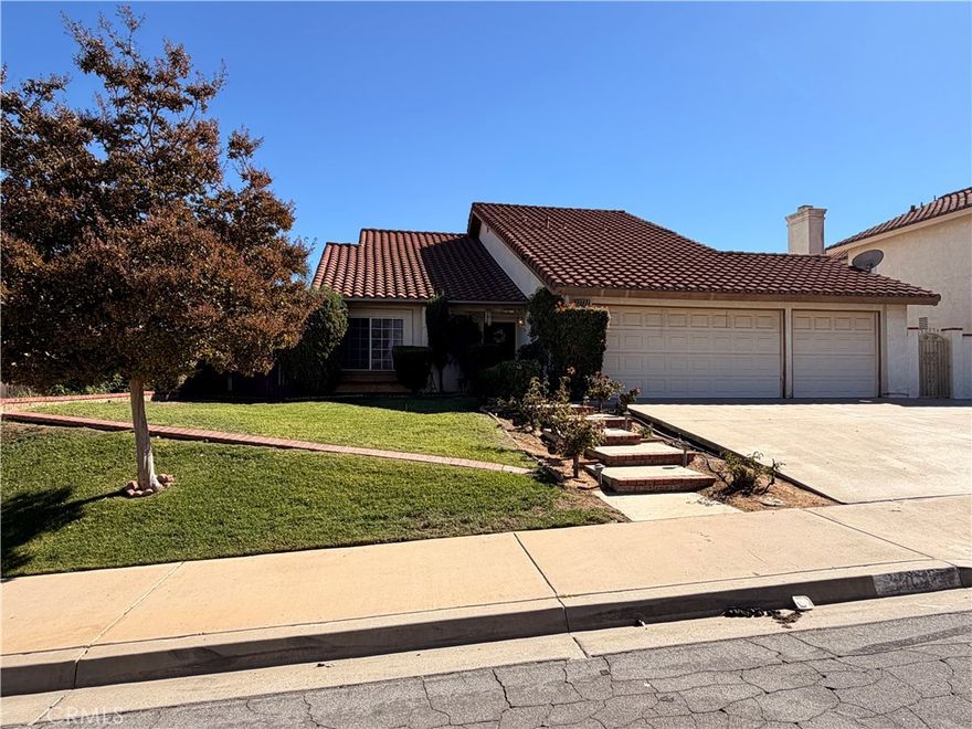 Welcome to 22731 Tea Rose, Moreno Valley. Nestled in the highly desirable Box Springs neighborhood of North Moreno Valley, this beautiful two-story home offers breathtaking views of the mountains and city lights. Featuring 4 bedrooms, 3 bathrooms, and approximately 1,699 sq. ft. of living space on a generous 8,000+ sq. ft. lot, this property perfectly blends comfort, functionality, and charm. As you step inside, you’re greeted by soaring ceilings, abundant natural light, and wood laminate flooring that flows through the formal living and dining areas. The open family room features a cozy fireplace and a gorgeous view of the backyard, creating the perfect setting for relaxation or entertaining. The spacious kitchen offers updated countertops, ample cabinet and counter space, and includes all appliances, making it move-in ready. Downstairs, you’ll find a bedroom and full bathroom—ideal for guests, in-laws, or multigenerational living. Upstairs features two additional bedrooms, a shared hallway bathroom, and a large primary suite with its own private bath. A huge balcony—perfect for morning coffee or taking in spectacular sunsets. Additional highlights include ceiling fans in every room, a three-car garage with plenty of parking space, and a spacious backyard ideal for gatherings, gardening, or simply enjoying the outdoors. Located just minutes from shopping, dining, freeway access, and only 15 minutes from UCR, this home offers both convenience and tranquility in one of Moreno Valley’s most sought-after areas.