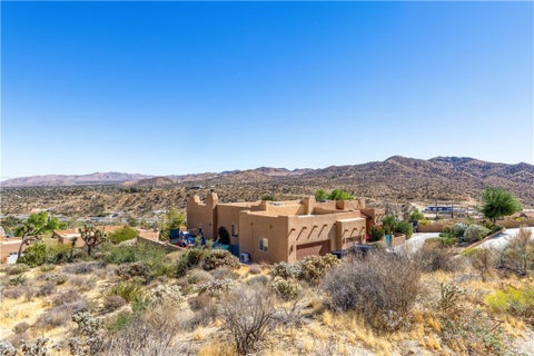 Photo of 7559 Rockaway Avenue, Yucca Valley, CA 92284 (MLS # JT26225501)