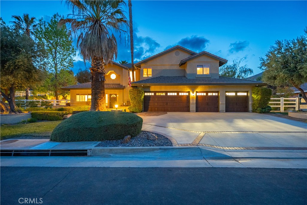 Breathtaking Estate in One of Acton’s Most Desirable Neighborhoods
Welcome to your dream home where luxury meets country living! Located on paved roads with LA County water and natural gas, this stunning 1.02-acre corner lot is beautifully landscaped and thoughtfully divided into two 0.5-acre sections, easily cross-fenced. The turnkey 4-bedroom, 3-bathroom main house offers 2,891 sq ft with a 4-car attached garage, brand-new doors, side-mounted openers, and a Level 2 – 50-amp EV charger.
Inside, enjoy fresh paint, updated flooring, modernized bathrooms, and Milgard double-pane custom windows with a lifetime warranty. The spacious family room features a gas fireplace and brick hearth, while the chef’s kitchen includes stainless appliances and granite countertops, flowing into a formal dining and living area with vaulted ceilings—perfect for entertaining. A downstairs bedroom and full bath offer direct access to your backyard oasis with a resurfaced pool and spa, tranquil water feature, new tile, app-controlled equipment, large cabana with built-in BBQ and outdoor fridge, plus a newly updated patio.
Upstairs offers a versatile loft, two bedrooms with an updated bath, and a master suite retreat with a custom walk-in closet, spa-style bath with garden tub, walk-in shower, and dual vanities. Custom bamboo hardwood floors enhance the living areas, with plush carpet in all bedrooms.
A separate gated driveway leads to a permitted 3-car detached garage with epoxy flooring, bathroom, and a fully equipped bar—soundproofed and perfect for entertaining or a music studio. Extras include a 50-amp outlet inside, RV hookup with sewer, fully owned 27-panel solar system, room for a barn or arena, mature trees, uplighting, and Wi-Fi irrigation. This equestrian-friendly neighborhood is your chance to enjoy country luxury without sacrificing convenience—no dirt roads, just comfort, privacy, and room to breathe!