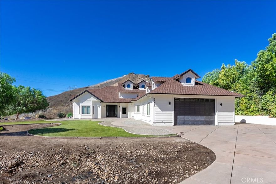 Welcome to 30903 Carmen Drive, Canyon Country — where comfort, space, and potential come together!
Nestled on a 1.25-acre lot at the end of a quiet cul-de-sac shared with only two other homes, this partially remodeled 3-bedroom, 2-bath ranch-style + plus bonus room and office space, residence offers peace, privacy, and stunning mountain views.
Originally built in 2007, the home has been thoughtfully updated to combine modern touches with its timeless charm. Step inside to be greeted by soaring high ceilings and an inviting open layout. The chef’s kitchen is equipped with a large island, granite countertops, double sinks, a 6-burner stove, stacked double ovens, and abundant cabinetry — perfect for entertaining or family gatherings.
Two spacious bedrooms with large windows share a full bathroom, while the expansive primary suite includes a beautifully remodeled bath featuring a walk-in shower, soaking tub, and dual sinks (with some finishing work remaining for your personal touch).
Additional highlights include a laundry room with washer, dryer, sink, and storage, a bonus room, and a massive high-ceiling garage ideal for vehicles or a workshop. Upstairs, a loft-style space offers flexibility for a family room, playroom, or office — with access to a private outdoor patio showcasing breathtaking mountain views.
This home offers the perfect opportunity to customize the finishing details and truly make it your own dream retreat.