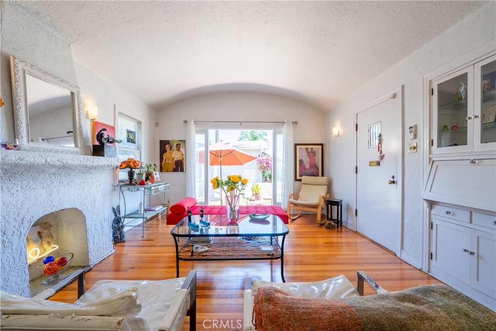 Welcome to 3908 East Verde Court—a hidden Spanish-style treasure tucked gracefully at the end of a quiet cul-de-sac in the vibrant heart of Long Beach. This soulful 2-bedroom, 1-bath single-story retreat invites you in with its romantic double front doors, classic stucco exterior, and timeless red-tiled roof that whispers charm before you even step inside.
From the moment you arrive, this home enchants. Natural light pours through the arched windows, casting a warm glow over the inviting living space. The interiors embrace a cozy, creative energy with just the right touch of vintage flair. The floor plan flows effortlessly from room to room, with thoughtful details throughout that speak to both comfort and inspiration.
Step outside to your very own sun-drenched sanctuary—an outdoor laundry room and bonus utility nook add function, while the private yard space is perfect for lounging under twinkling string lights or cultivating your own artful garden retreat. Just beyond, tucked around the side of the home, a tranquil koi pond awaits—bringing peace, movement, and a gentle rhythm to your daily routine. It’s a hidden jewel that feels like your own personal Zen escape.
The attached single-car garage offers storage or workspace potential, while the home’s placement—nestled quietly at the very end of the street—creates an added layer of peace and privacy rarely found in city living.
Why Long Beach? Because it’s more than a place—it’s a lifestyle. This diverse coastal city blends beach town charm with big city energy. Minutes from the ocean, Belmont Shore, Retro Row, and vibrant 4th Street, you’re surrounded by a rich tapestry of culture, food, music, and art. Long Beach offers miles of bike paths, a walkable waterfront, local coffee shops, indie boutiques, and community spirit in every neighborhood. Whether you’re headed to a sunset yoga class, brunching by the marina, or catching live jazz at a hidden gem, Long Beach delivers.
3908 E Verde Ct isn’t just a home. It’s your creative escape, your storybook beginning, your heart-led next chapter.
Fall in love. Live inspired. Welcome home. Make us an offer we can not refuse! More photos to come so stay tuned!