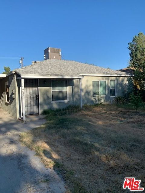 Photo of 44606 Date Avenue, Lancaster, CA 93534 (MLS # 22201689)