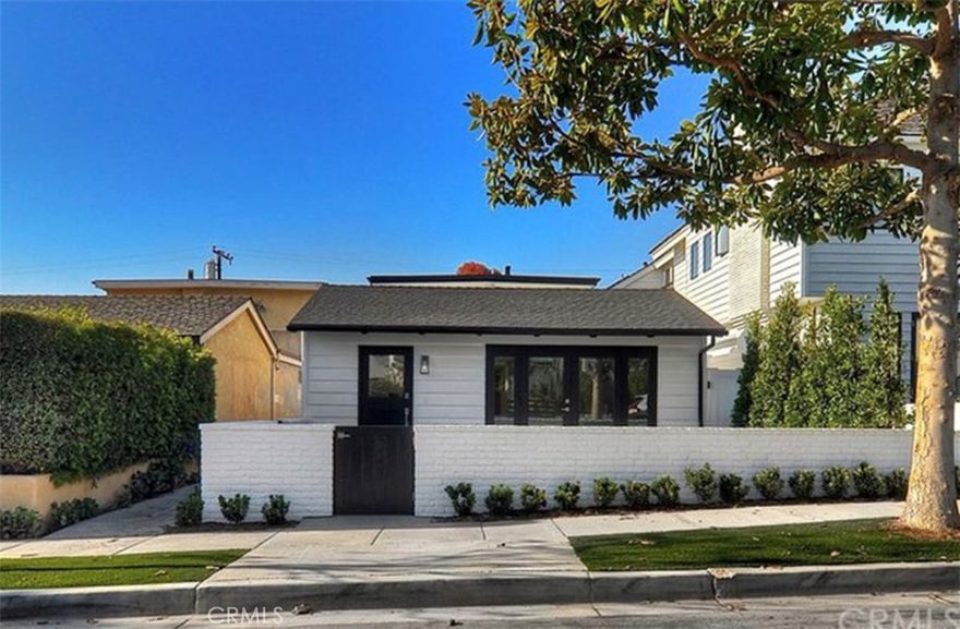Live on one of the most sought-after streets in Corona del Mar Village. 619 Poinsettia is a beautifully remodeled 3-bedroom, 2-bath front unit offering refined coastal living in the heart of the Village. The open-concept kitchen showcases all-new stainless steel appliances, a large center island with bar seating, and extensive cabinetry and storage. The bright family room features a white brick fireplace and opens through double doors to a spacious patio perfect for entertaining or relaxing. The primary suite includes a generous walk-in closet and updated bath, while two additional bedrooms with built-ins share a remodeled hallway bath. Rare two-car enclosed garage parking, laundry, and air conditioning add convenience and comfort. Ideally located within walking distance to the area’s best restaurants, coffee shops, boutiques, and Big Corona Beach.