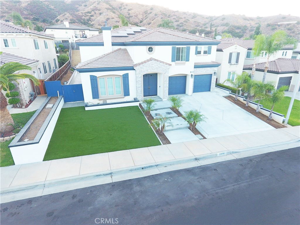 Beautiful, move-in-ready home in Montecito Ranch, Temescal Valley/South Corona. This spacious 5-bedroom, 4-bathroom residence features formal living and dining rooms, a large great room, and a lovely kitchen that boasts both a butler's pantry and a walk-in pantry. The open floor plan offers plenty of potential, and as the largest model in the neighborhood, it showcases an inviting double-door entry and nearly 4,100 square feet of living space. According to assessor records, the home is listed as a 4-bedroom, but the downstairs den/office is currently used as a bedroom (minus a closet, which can be added if desired), making it function as a 5-bedroom home. The property also includes a 3-car garage, with 2 spaces in a tandem configuration. With great local schools, low HOA fees, and a prime location near parks and shopping centers, this is a fantastic opportunity to become part of a wonderful community.