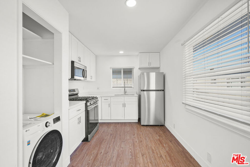 Welcome to Alamitos Beach! Step into a fully remodeled 1BD/1BA unit filled with natural light, with a bright living room, dining area, renovated bathrooms and fully equipped kitchen with brand new LG appliances with fridge, stove, microwave, garbage disposal, as well as new countertops, new cabinets, new fixtures. Upgrades also include new vinyl and recessed lighting throughout. Stay cool with brand new split AC units for added comfort. Includes washer and dryer conveniently located in unit. Relax outside and enjoy a large backyard area with new landscaping. Just blocks to the beach and conveniently situated between downtown Long Beach and Belmont Shore, enjoy this upgraded space in one of the best areas of Long Beach. 10 min drive to Long Beach University, Costco, recreational park/golf course and walking distance to the grocery outlet and Ben Franklin Middle School. Street parking. Close proximity to shopping, dining, and easy access to the freeways. Also available furnished for $2,500/mo. Come see it today!