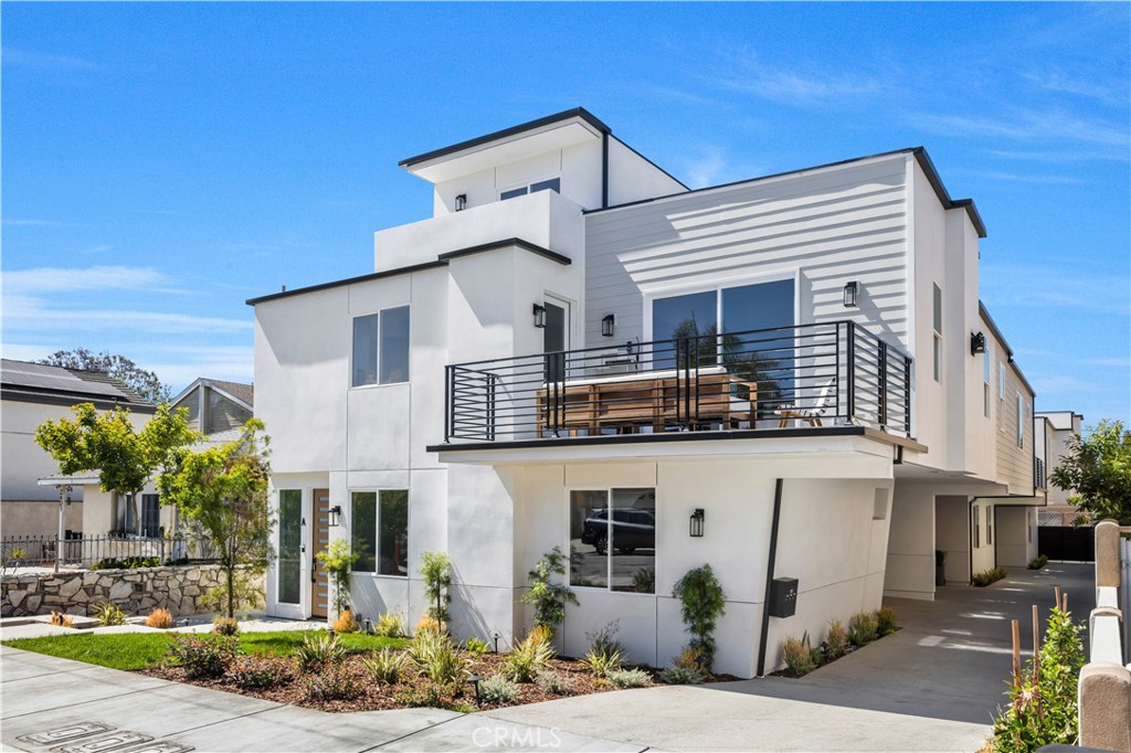 Welcome to your dream home in the heart of North Redondo Beach! This luxurious new construction rear corner-unit offers a rare blend of elegance, innovation, and functionality. Designed with modern living in mind, this 4-bedroom, 5.5-bathroom residence spans multiple levels and showcases meticulous craftsmanship throughout. Step inside to discover soaring vaulted ceilings, abundant natural light, and an open-concept floor plan perfect for entertaining. The spacious living room features a sleek fireplace and flows seamlessly into the dining area and gourmet kitchen, which is equipped with top-of-the-line appliances, custom cabinetry, and premium finishes for the most discerning chef. A versatile mezzanine level provides the ideal space for a home office, gym, or bonus lounge area. Each of the four bedrooms is generously sized, with en-suite bathrooms that exude spa-like tranquility. The primary suite offers a private retreat with a luxurious bath and walk-in closet. This home is designed for future-forward living with solar panels, EV charging capabilities, and central air conditioning for year-round comfort. Enjoy privacy and curb appeal in this rear corner unit, with easy access to beaches, top-rated schools, parks, and all that the South Bay lifestyle has to offer.