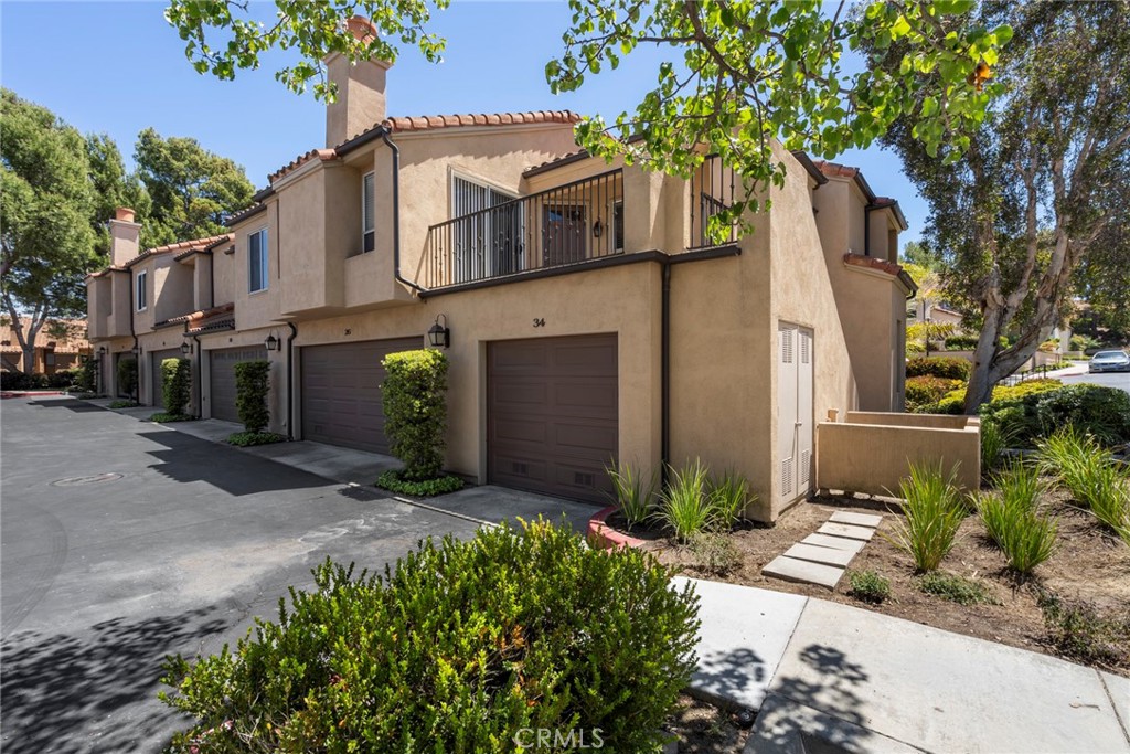 This charming, upper end-unit unit condominium in Corsica Villas has it all- most notably, an amazing location close to the Back Bay trail system, UCI, freeways, Fashion Island and beaches. The condo itself has been freshly painted and updated, and has two bedrooms, including a main bedroom with vaulted ceilings and huge walk-in closet, one bathroom with separate vanities, and a great room with a gas fireplace and sliding doors to the spacious, private patio. The kitchen is light and bright, and includes stainless steel LG appliances. The laundry space is inside the home, and boasts an LG front-load washer and dryer. Central heat and A/C. A private one car garage is conveniently accessed at the bottom of the stairs. Community amenities include a refreshing pool and spa! This is an excellent value for Newport Beach!
HOA dues, trash, and landscape of common areas are included in rent. This is a pet -free property, however; there are exceptions under state and federal laws. One year min. lease. Excellent payment history and landlord references, employment will be verified.
