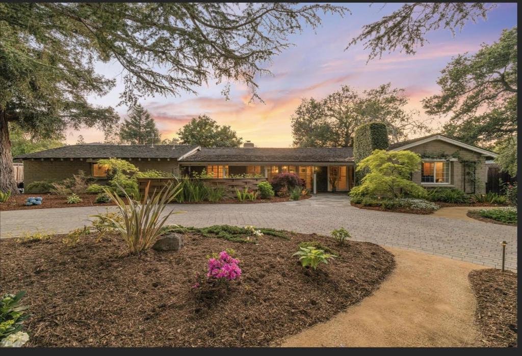 Built in the classic California ranch tradition, this home showcases the timeless features that made this architectural style the dominant American home design during the post-war era. The property embodies the hallmark characteristics of authentic ranch homes: a single-story layout with a long, low-pitched roofline, creating that iconic horizontal profile that connects seamlessly with the surrounding landscape. The home's design reflects the rich heritage of early California haciendas and ranchos, with their emphasis on indoor-outdoor living. 690 Torwood Lane features spacious, open floor plans that separate living areas from bedrooms for optimal comfort and privacy. This property boasts vaulted ceilings with exposed beams, creating dramatic interior spaces filled with natural light. Sliding glass doors opening to patios, and large windows establish the indoor-outdoor connection that defines the California ranch lifestyle. The home sits on a generous parcel, and includes a spa/hot tub and in-ground pool. This rare offering represents more than just a home it's an opportunity to own a piece of California's architectural heritage while enjoying the modern amenities and exceptional quality of life and great schools that Los Altos provides.
