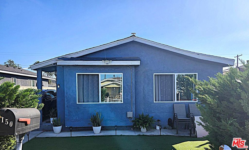 Photo of 1150 E 80th Street, Los Angeles, CA 90001 (MLS # 26985277)