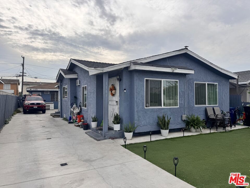 Photo of 1150 E 80th Street, Los Angeles, CA 90001 (MLS # 26985277)
