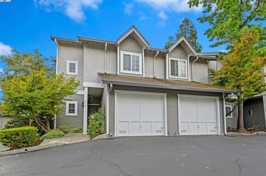 Beautifully renovated north-facing townhome on a quiet lane across from Kottinger Village Park and just a short walk to downtown Pleasanton’s charming shops and restaurants. Step inside to find White Oak laminate flooring throughout, accented by newer 4-inch baseboards and soft neutral paint. The updated quartz kitchen features stainless steel appliances including a gas range, refrigerator, and built-in microwave. A cozy family room showcases soaring vaulted ceilings, a skylight that fills the space with natural light, and a custom gas fireplace with mantle. The adjacent dining area opens to a private patio through new Andersen French doors, creating seamless indoor-outdoor living. Upstairs, two spacious bedrooms each feature renovated quartz bathrooms. The primary suite offers a walk-in closet, while the second bedroom enjoys a private balcony retreat. A convenient upstairs laundry closet includes a high-efficiency washer and dryer. Additional highlights include EV car charger, dual-pane windows with plantation shutters, a new roof scheduled for November, newer HVAC, deck, and fencing, ensuring comfort and peace of mind. This turnkey home blends modern updates with an unbeatable location—a rare find that won’t last long!