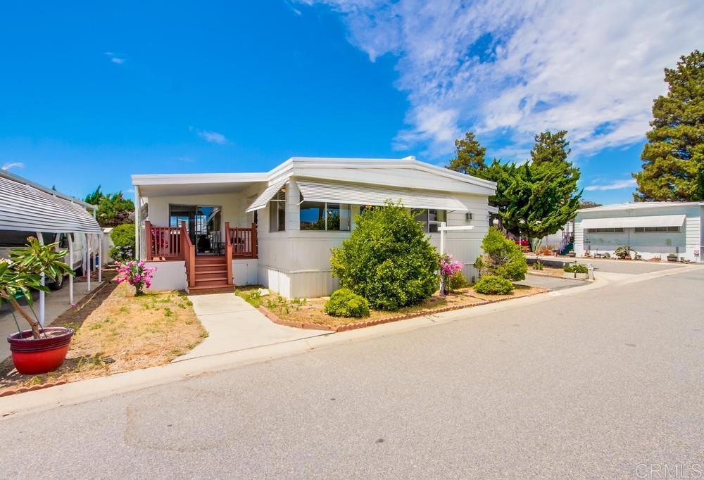HANDYMAN SPECIAL! Mostly original and the home needs upgrading throughout - inside and outside. 2br 2ba. 1440sqft. Plus large Calif Room. 1972. NO PROPERTY TAXES! Corner Lot with lovely views of clubhouse lawn and greenery. Space rent is about $587. Sold AS IS. Seller will not do any repairs. The park does not allow flippers or investors. Buyer must be over age 55 and live in the home. Park Approval is required with good credit and income. 2 small pets ok. Just outside the park entrance are numerous restaurants, banks, grocery stores, Walgreens, Starbucks, Oceanside Library, and Oceanside Police Dept. This private senior community is about 5miles to the beaches and the charming Oceanside Harbor and Pier. There is a bike path close by that takes you all the way to the beach. Oceanside is loaded with restaurants, quaint shops, farmers markets, lots of places to walk around downtown.