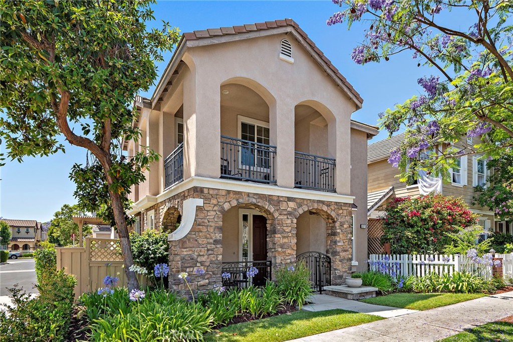 Welcome to 81 Mercantile Way in Ladera Ranch — a rare END-LOT detached home in the highly desirable Gables community. This upgraded Plan 3 model offers 1860 sq ft, 4 bedrooms, 2.5 baths, a remodeled kitchen, full PEX Re-Pipe, oversized 2 car garage, covered front porch with room to relax, balcony off primary, ideal layout with open circular flow on the main level and all 4 bedrooms upstairs, and an unbeatable Ladera location offering a rare walkable lifestyle with easy access to shops, restaurants, coffee, groceries, gym, schools, parks and pools. The premium END-LOT location is a game changer and makes the home unique in the community—with no neighbor bordering the side yard the outdoor space is greatly enhanced. The remodeled kitchen features Caesarstone quartz countertops, full-height marble backsplash, farmhouse sink, newer stainless steel Maytag appliances, bar seating, and a sunlit breakfast nook with bay window. Flooring has been upgraded throughout with laminate upstairs and downstairs, and solid oak hardwood stairs with white risers and custom banister. The open-concept living space includes a family room with cozy fireplace with custom surround & mantel flanked by original builder-installed window sidelights. French doors lead to a private side yard and covered patio with gas hookup—perfect for BBQs or firepit. Unique to this lot, there’s no neighbor on this side, offering extra privacy, sunlight, breezes, and unique openness. The oversized 2-car garage features high ceilings, epoxy floor, windows, and custom storage. Upstairs, all 4 bedrooms offer ceiling fans and junction boxes. Convenient 2nd-floor laundry room with newer washer and dryer which are both included. The primary suite includes a private balcony with foothill views, custom barn door to the en-suite bath with a generous walk-in closet, Corian counters, dual sinks, soaking tub and separate shower. One bedroom currently configured as office and downstairs powder room includes custom wall paneling. Enjoy a rare walkable lifestyle with easy access to the Mercantile Shops, Oslo Coffee, Ten Mile Brewing, Rancho Capistrano Winery, Trader Joe’s, Franco’s, Lucky Strike Bowling, gyms, parks, pools, Concerts/Movies in the park at Town Green and the Sunday Farmers Market & 4th of July Fireworks at Founders Park. Just a short walk to highly-rated Chaparral Elementary & Ladera Ranch Middle School. Original owner with great pride of ownership, come see this special home in an unbeatable location!