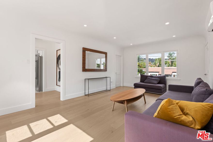 Situated on one of Beverly Grove's most desirable and quiet streets, this updated 1-bedroom, 1-bath detached ADU offers a bright and comfortable living space. The home features new wide-plank oak flooring, a modern kitchen with quartz countertops and stainless steel appliances, and an updated bathroom with contemporary finishes. Additional features include an in-unit washer and dryer, split unit AC and heating, and one covered garage space. The unit can be leased fully furnished for convenience or unfurnished if preferred. The property is fully hedged for privacy and located close to Melrose Avenue, The Grove, and West Hollywood. A great opportunity to enjoy an updated home in a prime Beverly Grove location.