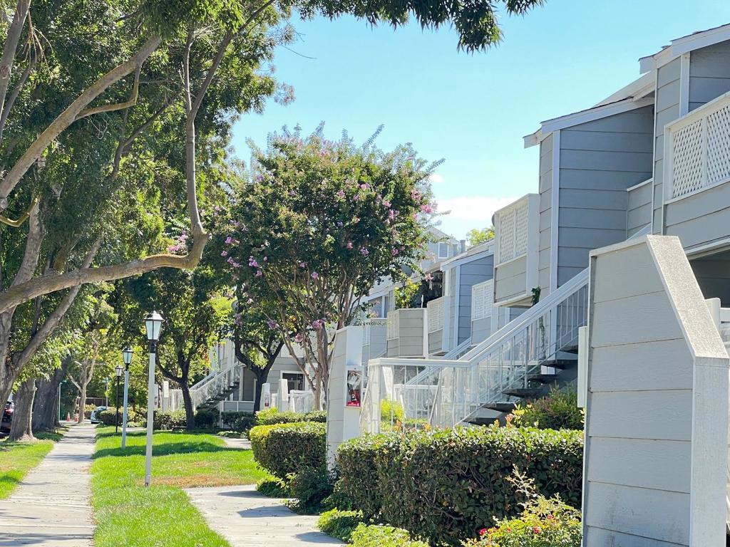 A charming 2-bed, 2-bath upper-level home in the desirable Village Square community of San Jose, this bright and well-maintained corner unit offers thoughtfully designed living space with an open floor plan, high ceilings, and abundant natural light streaming through the skylight. The updated kitchen features granite countertops, a brand-new cooking range, and ample cabinet space, while the spacious living area opens to a private balcony. Additional highlights include in-unit laundry, a combination of laminate and tile flooring, and a detached oversized 1-car garage. Residents enjoy access to a community pool and spa, beautifully landscaped grounds, and unbeatable convenience with quick access to freeways (680, 880, 101), major tech employers, shopping destinations like H Mart, Ranch 99, Sprouts, Costco, and the Berryessa BART station. Ideally located just across the street from the San Jose Municipal Golf Course, this home blends comfort, style, and convenience. Prefer credit score 700+ and no pets.