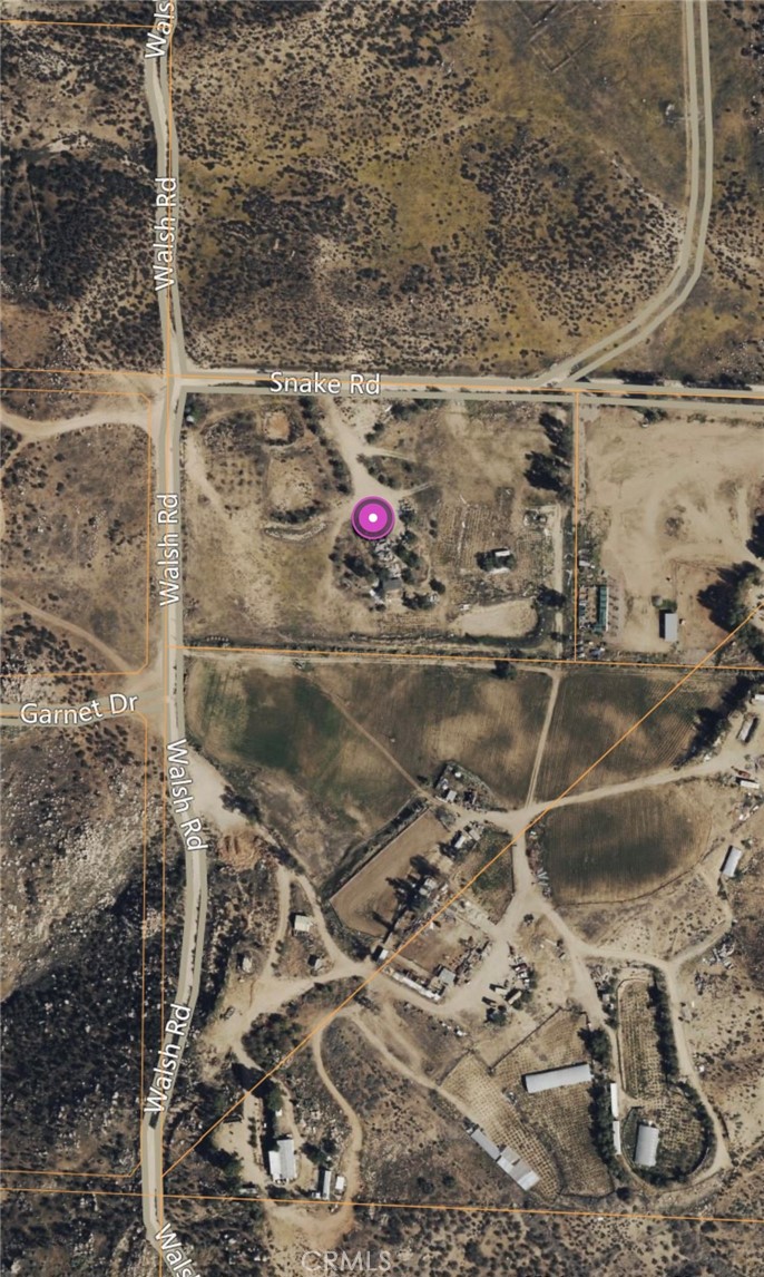 Build your dream home on this 6.5-acre parcel with stunning views of the hills and mountains. Enjoy the tranquility of country living just a short drive from city amenities. A perfect blend of nature and convenience—this property is priced to sell. Contact agent for more information.