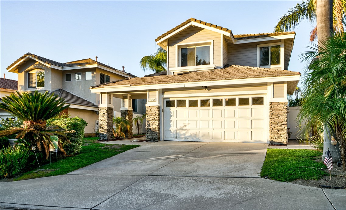 Welcome to The Highlands in Anaheim Hills! Tucked away on a quiet street, this spacious 4-bedroom, 3-bathroom home with a large office offers one of the best floor plans and view lots in the neighborhood. From its vaulted-ceiling entry to its expansive canyon and mountain vistas—snowcapped peaks in the winter—this home combines comfort, potential, and an unbeatable location.
Inside, the thoughtful layout features a formal living room with surround sound speakers, a dining area with custom cabinetry, and a cozy family room with a fireplace and direct access to the backyard. The kitchen stands out with granite counters, custom cabinetry, skylights, and upgraded stainless steel appliances. Just off the living room is a large custom office with built-in storage and wood cabinetry. Upstairs, all bedrooms are conveniently located, including a primary suite with a private balcony showcasing spectacular views and excellent potential for future closet and bathroom expansion. Two additional bedrooms share a dual-sink bathroom with separate enclosed shower and toilet area for added privacy., ideal for functionality and convenience.
The backyard is designed for entertaining with recently upgraded concrete, custom landscape lighting, a built-in BBQ, large fire pit, and a scenic viewing deck to take in city lights and sunsets.
Additional highlights include real wood flooring upstairs and on the stairs, luxury vinyl flooring over tile, updated HVAC (5–7 years), newer water heater (2 years), skylights, custom window shades, ample garage storage, and a separate washer/dryer area.
Perfectly situated near award-winning schools (Canyon Rim Elementary, Canyon High, and Running Springs Elementary), parks, hiking/biking trails, shopping, dining, and with easy access to the 91, 55, 71, and 241 freeways, this property offers exceptional value in one of Anaheim Hills’ most sought-after communities.
With its generous square footage, incredible views, and prime location, this home is ready for its next owner to make it their own. Don’t miss the opportunity!