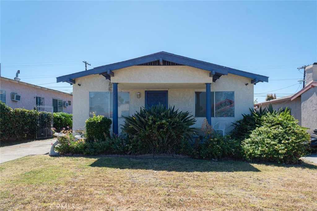 Charming Los Angeles Gem with Spacious Layout & Prime Location. Welcome to this beautifully maintained Conventional-style home featuring 2 bedrooms and 1 bathroom, perfect for first-time buyers, downsizers, or savvy investors. A detached two-car garage and an oversized driveway offer parking for six to seven vehicles — ideal for entertaining or multicar households. Step inside to a bright and open living room with hardwood flooring, recessed lighting, and a decorative fireplace that adds warmth and charm. The open floor plan flows seamlessly into a well-appointed kitchen with a center peninsula, offering ample counter space for cooking, dining, or gathering with family and friends. Both bedrooms feature hardwood floors, ceiling fans, and generously sized closets, providing comfort and convenience.The spacious backyard is a standout feature — boasting a manicured lawn that’s perfect for outdoor dining, play, or relaxing year-round in the Los Angeles sunshine. Location is everything, and this home is centrally situated near world-class entertainment venues: just minutes from Crypto.com Arena, SoFi Stadium, and the new Intuit Dome — making it a fantastic opportunity for long-term value or income potential. Don’t miss this incredible chance to own a home in one of LA’s most dynamic areas — schedule your tour today!