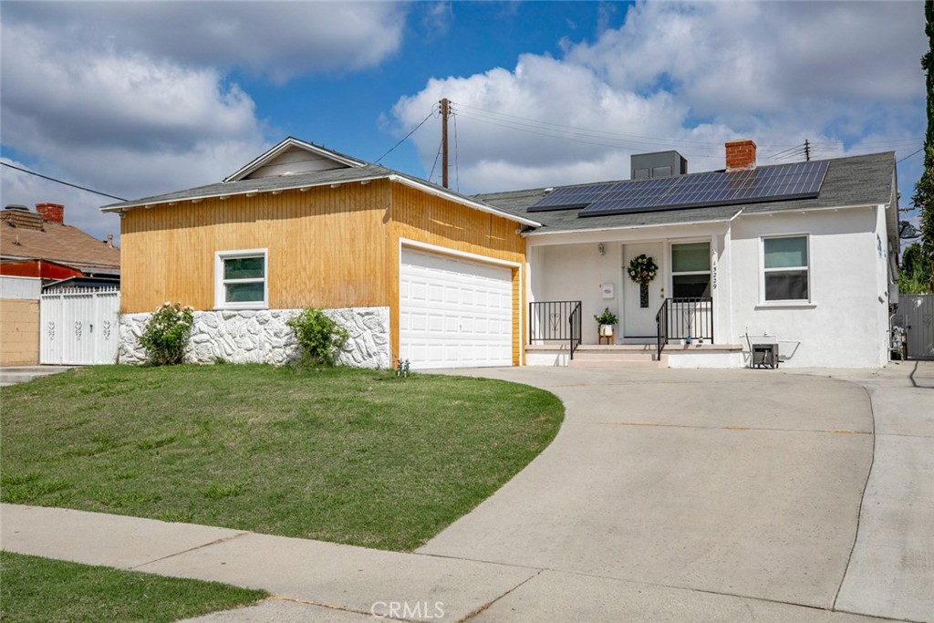 Located on a peaceful residential street in the heart of Van Nuys, 15229 Burton Street is a beautifully updated single-story home that offers the perfect blend of modern upgrades and timeless charm. With a bright and functional layout, energy-efficient systems, and a large backyard, this property is ideal for families, first-time buyers, and anyone looking to invest in a turn-key home with long-term potential.
Interior Features & Layout
As you step through the front door, you’re greeted by a spacious and sunlit living room featuring gleaming hardwood flooring, a neutral color palette, and dual-pane white vinyl windows that allow natural light to flood the space. The open-concept design offers a seamless flow into the dining area and fully renovated kitchen — creating a warm and inviting atmosphere for both entertaining and daily living.
The kitchen is a standout feature of the home, recently remodeled with Corian countertops, new tile backsplash, updated cabinetry, and modern stainless steel appliances including a new stove, hood, and dishwasher. Whether you're cooking for a crowd or preparing a quiet meal at home, the layout is both practical and stylish, with ample counter space and storage.
Down the hall, you’ll find three generously sized bedrooms, all with hardwood floors and generous closet space. The primary bathroom is a true retreat, complete with a walk in shower and updated finishes, while the second half-bathroom adds convenience for guests or busy households.