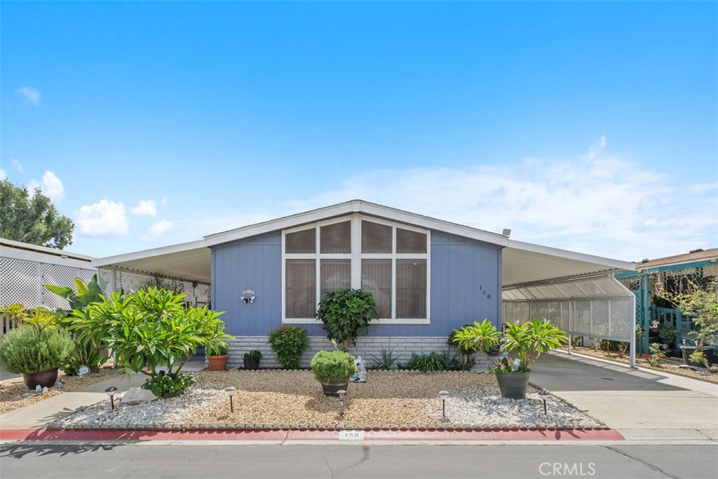 This beautiful 2-bedroom, 2-bath mobile home is a must-see in the sought-after community of Rancho Ontario. Residents enjoy fantastic, renovated amenities, including a heated pool and spa that are open all year. The community hall is available to host any event, and the clubhouse features a billiards room, a card table room, a fitness center, and a comfortable lounge area. The park also offers plenty of ways to stay active with two pickleball courts and a bocce ball court. Your furry companions will feel right at home with two dedicated dog parks. Don't miss the chance to tour this home and make it yours.