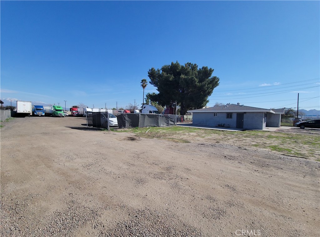 Great opportunity to buy a truck transportation yard with an office.Perfect for the small trucking operator. 39,000 sqft lot, 130x299. Has a 3 bedroom, 1 bathroom, currently being used as an office. Owner currently stores over 20 trucks and runs transportation business and out of there.