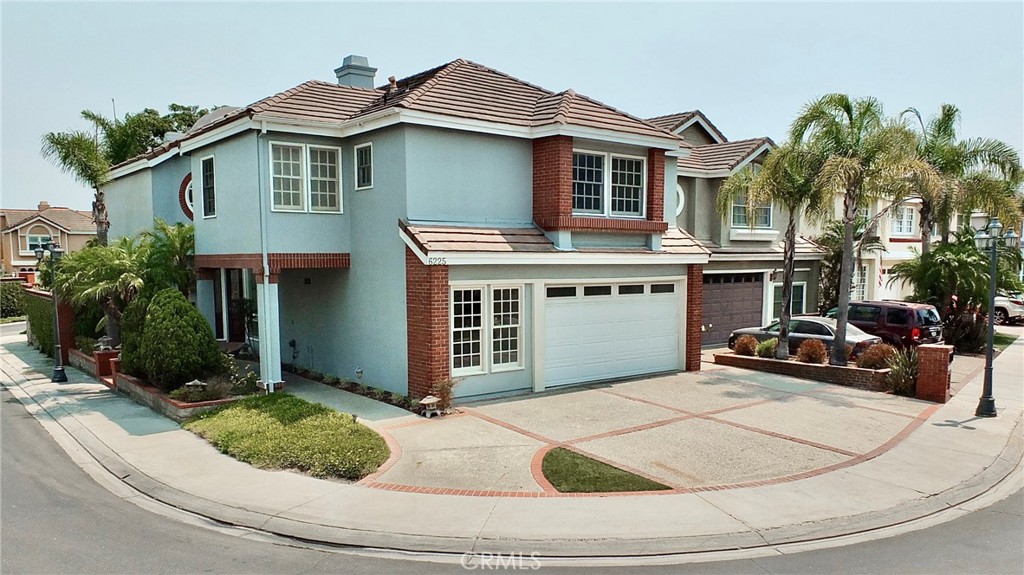 Set anchor in this picturesque waterfront of quiet splendor in the prestigious Alamitos Bay region of coastal Long Beach. This exclusive enclave is called Bay Harbour and this truly magnificent luxury home awaits your arrival. This fine property has been recently updated and represents a platinum opportunity for you and yours to live in an exceptional home built in the classic Mediterranean architectural style. An impressive corner lot location with a tropical garden approach invites you to the formal entry. A sun-filled and updated gourmet kitchen enjoys an open flow to the fireside family room. This room opens to the finished 2 car garage and a laundry/bathroom that directs you to a hideaway retreat or guest quarters. Also, downstairs you will find another versatile room that can be used as a 5th bedroom, office or additional guest quarters. The step-down living room and well-placed dining room entice you to the sun-drenched patio style backyard.
The spectacular grand staircase leads to an upper-level library and off to upstairs bedrooms 2 and 3 which are both en-suite with private bathrooms. The amazing primary suite complex boasts soaring ceilings and glass doors leading to a balcony along with an office or sitting room. The luxurious primary bathroom boasts: 2 private commodes, shower stall, dual vanities and a skylit soaking tub. All this estate like serenity is only steps away from the waterfront. Bay Harbour offers resort-like tennis and pickle ball courts, pools and spas, along with seldom mentioned access to a hidden dockside park with shopping and fine food just steps away. Bay Harbour is living at its best!