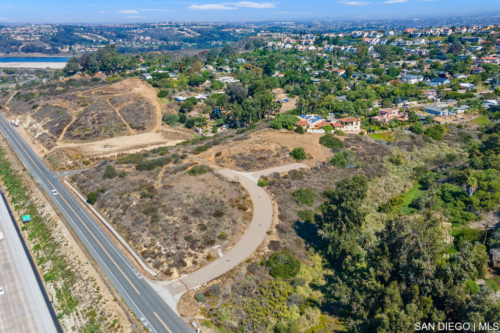 Incredible Opportunity to build in one of the most sought after areas surrounded by multi million dollar homes! peek a boo bay and ocean view. private street. A quick jot down to world famous south Ponto beach, grand view surf, Leucadia beach and Encinitas county park. If you like to golf Omni Resort or Encinitas Ranch Golf! Walking distance to Olympus park for family fun a zipline for the kids, slides, skate ramp and a dog park. Botanical Gardens galore Shopping, Restaurants you will never get bored.